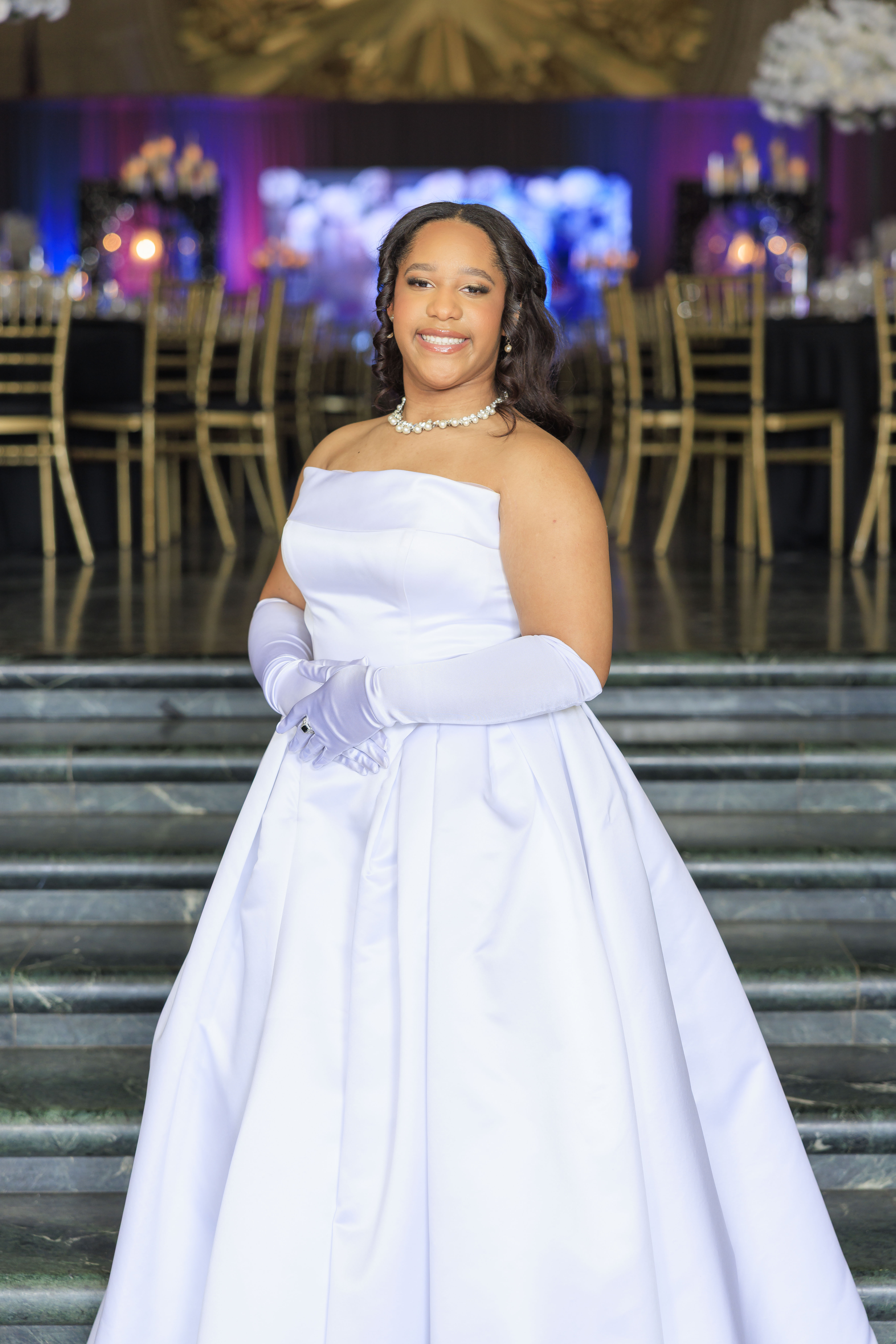 Brooke on the grand staircase at Texas Hall of State